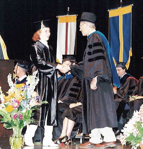 shelleygraduationgettingdiploma.jpg